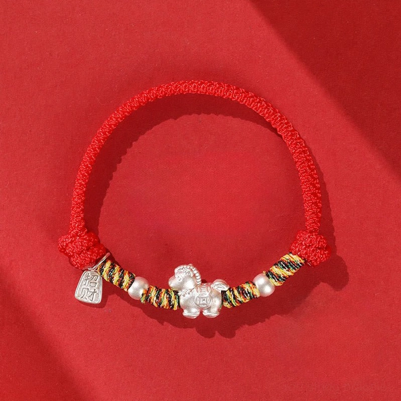 999 sterling silver horse red string bracelet with fortune charm flat lay