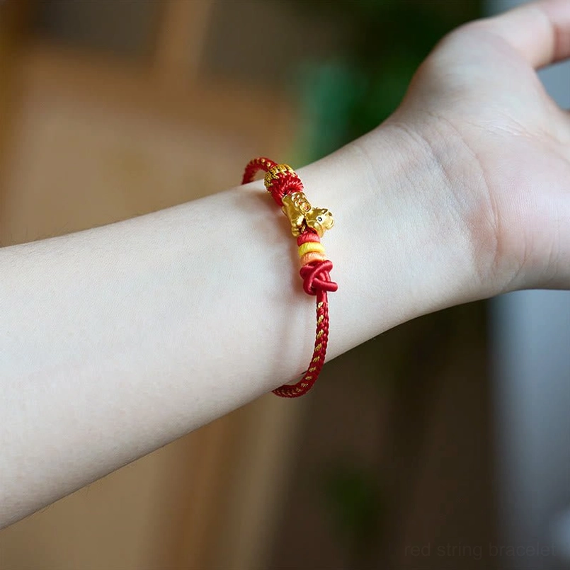 Red string horse bracelet worn on wrist - natural daily wear styling