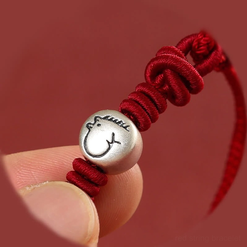 Horse zodiac protection bracelet with braided red cord and silver bead, spiritual jewelry piece
