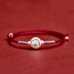 Year of the Horse sterling silver red string bracelet with adjustable knots and silver horse charm