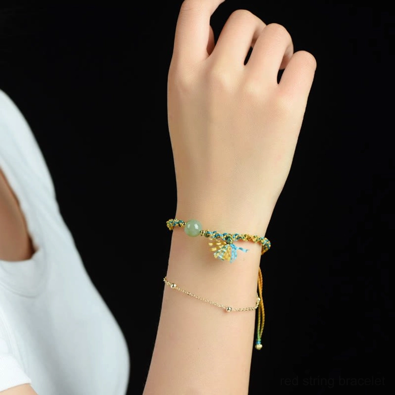Wrist-worn double-layer jade bracelet on woman showing everyday styling