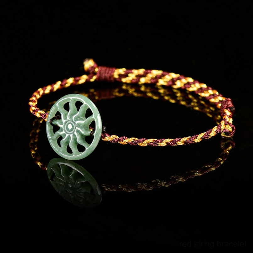 Jade sun braided bracelet overhead shot on reflective black background