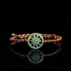 Jade sun braided string abundance bracelet main flat lay studio shot