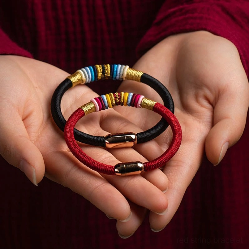Black and red braided King Kong Knot bracelets with magnetic clasp close-up detail