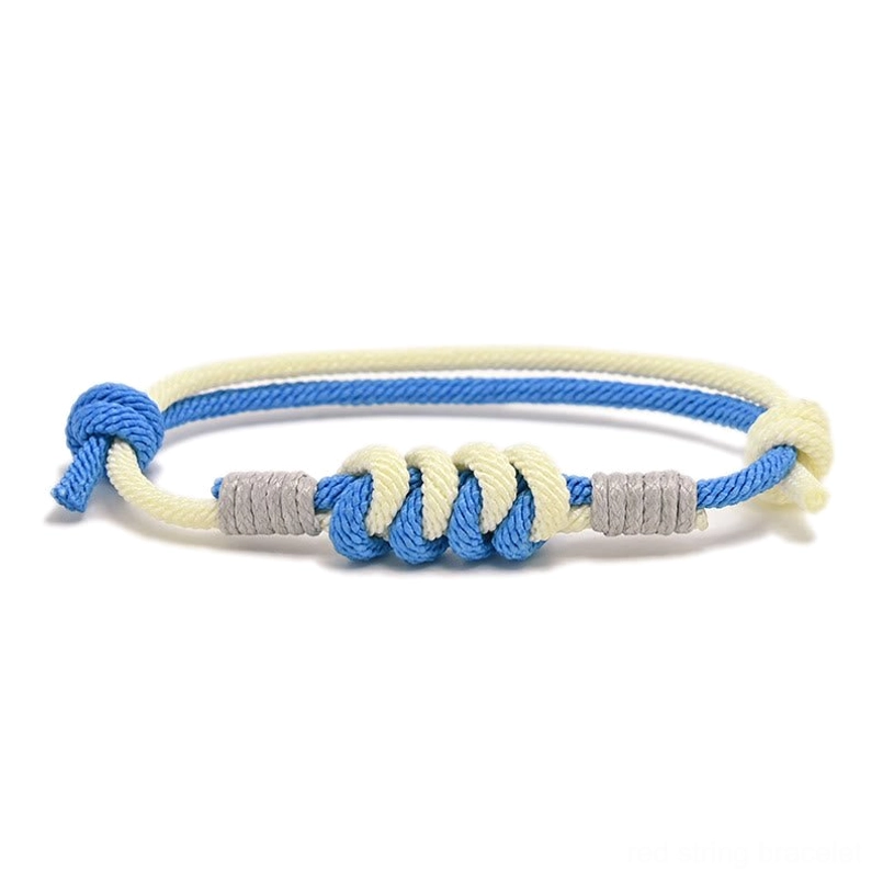 Blue and gray King Kong knot protection bracelet, handcrafted braided design, overhead view