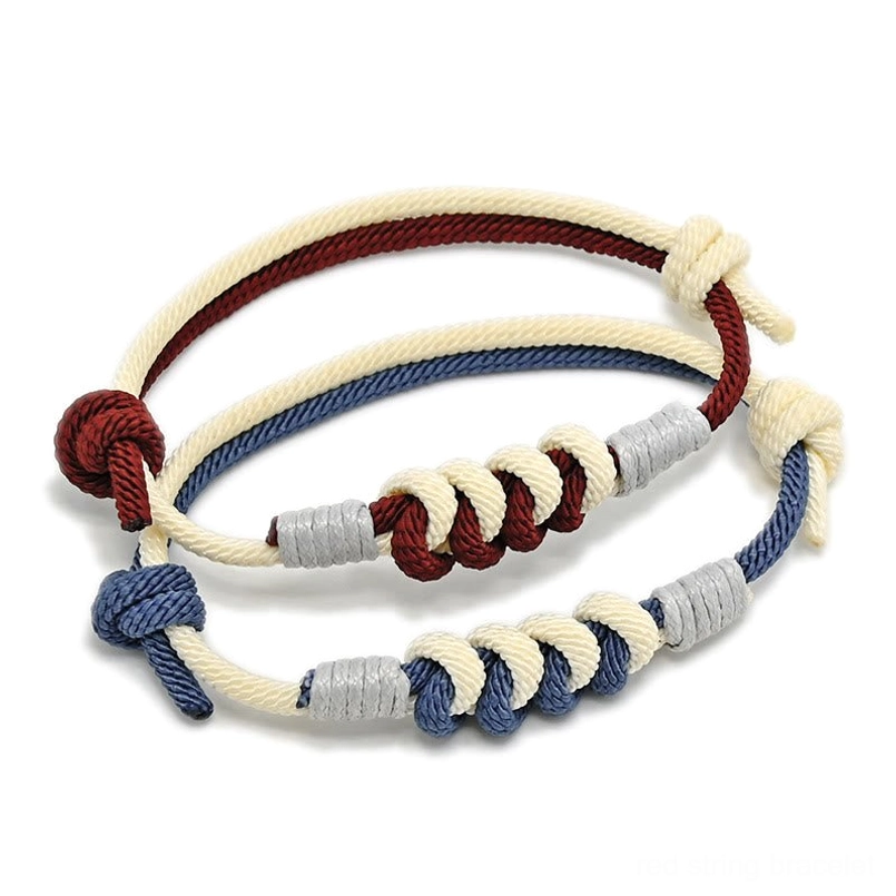 King Kong knot bracelet close-up showing copper fasteners and sacred Buddhist knot detail