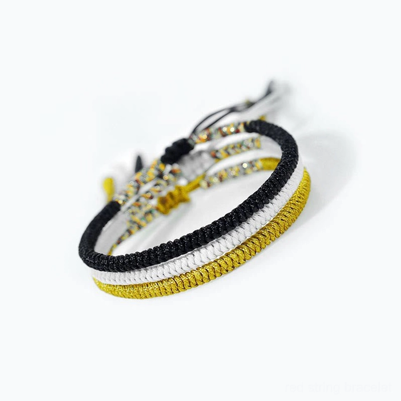 Handmade Tibetan King Kong Knot protection bracelet detail showing woven knot pattern and adjustable drawstring