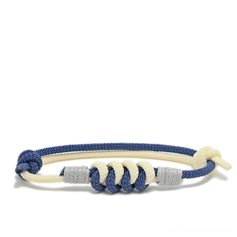 Handcrafted King Kong knot bracelet showing intricate braided string work and copper accents