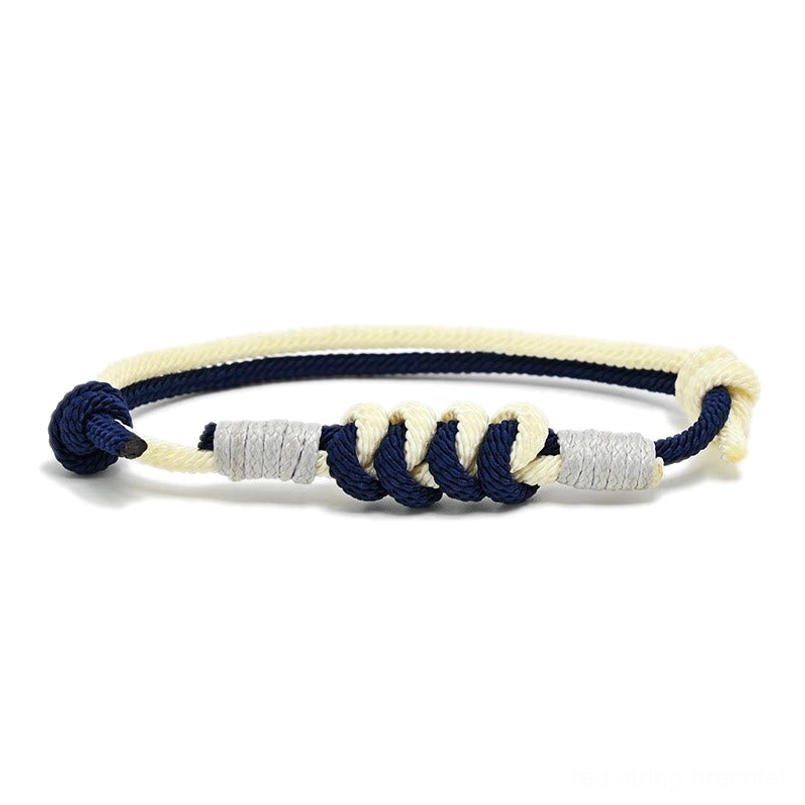 Navy King Kong knot string bracelet worn on wrist, demonstrating fit and everyday style
