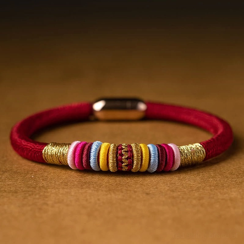 Tibetan King Kong Knot bracelet close-up showing layered colorful woven accents and metal buckle