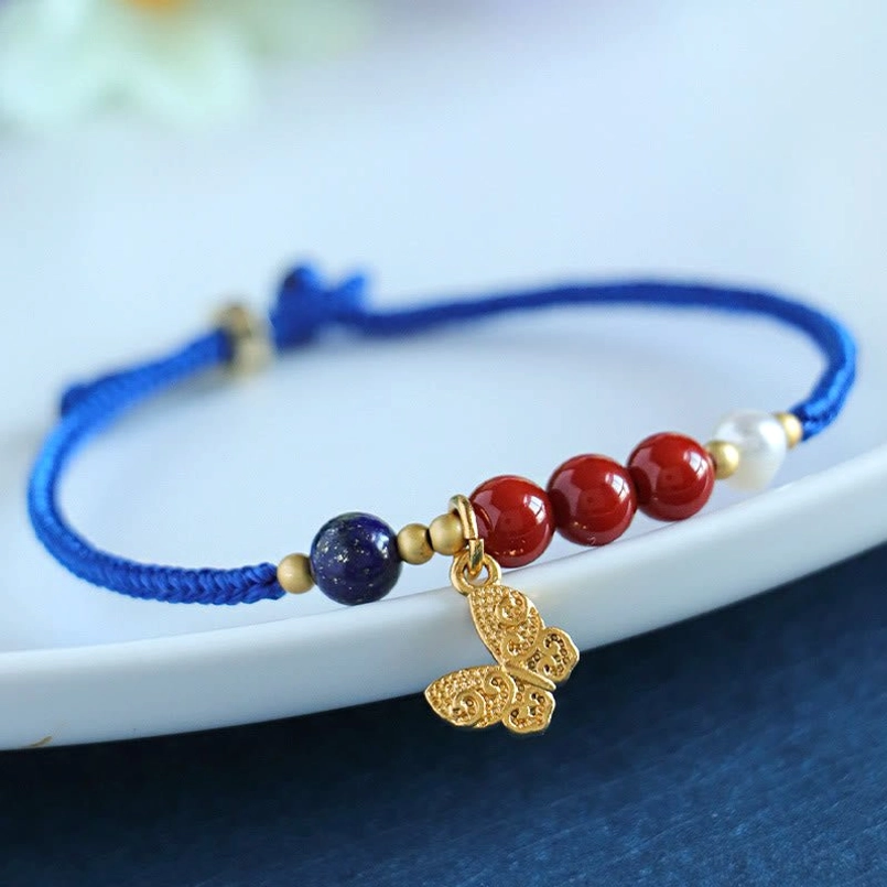 Klein blue string bracelet with south red agate lazurite and copper butterfly charm