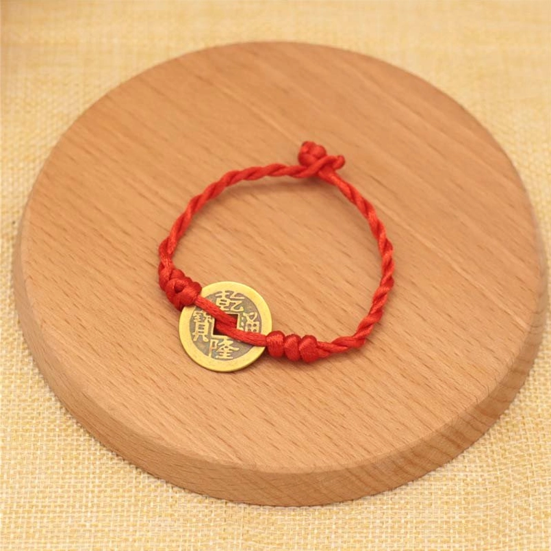 Red string knot copper coin bracelet, sacred Buddhist weave design