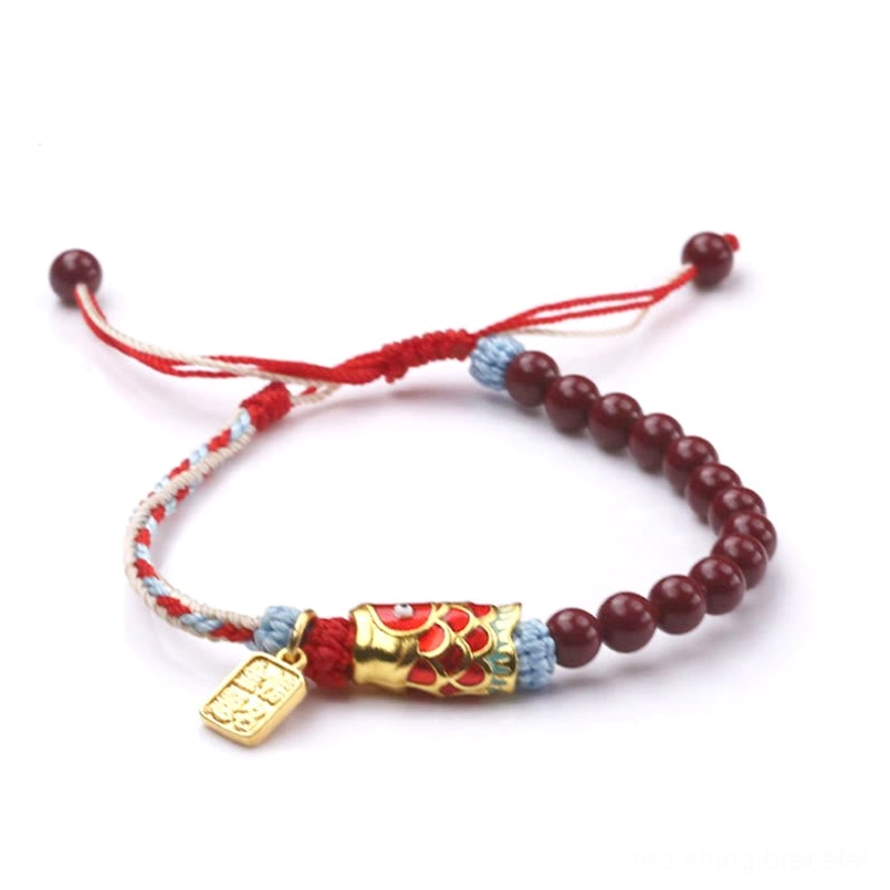 Adjustable red string koi bracelet with cinnabar beads and drawstring closer detail