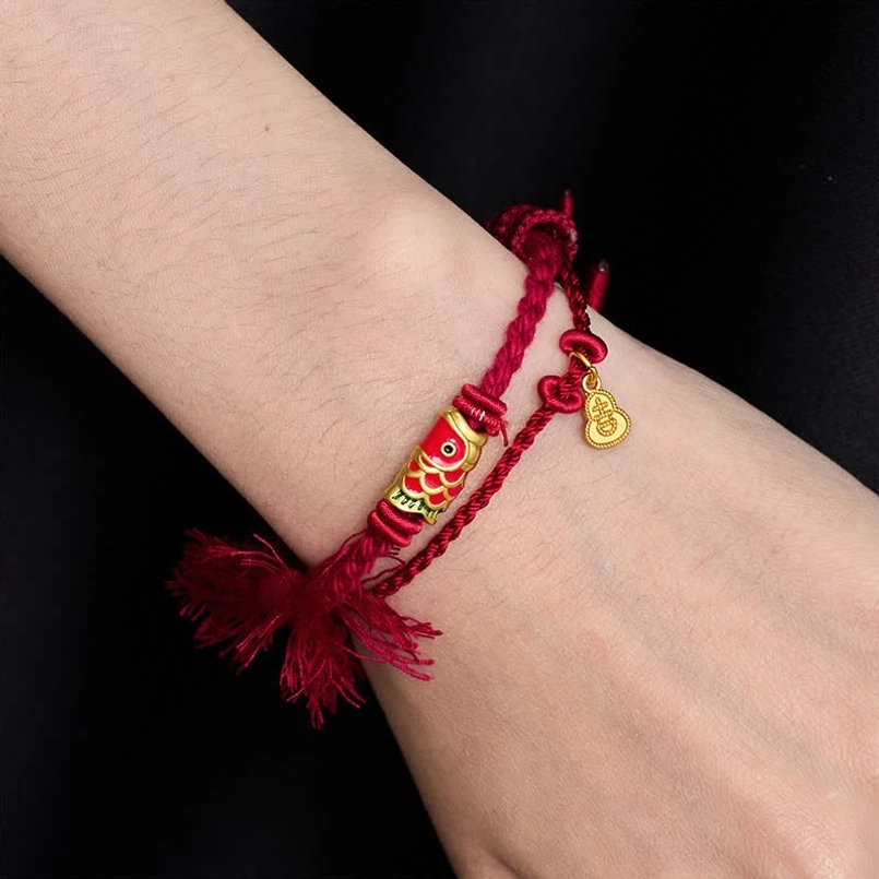 Red Double-Strand Koi Bracelet Worn on Wrist - Lifestyle Wear View