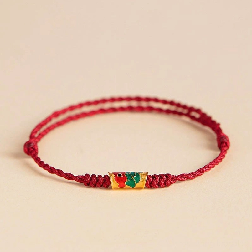 Classic red koi fish prosperity bracelet simple version on beige background close-up