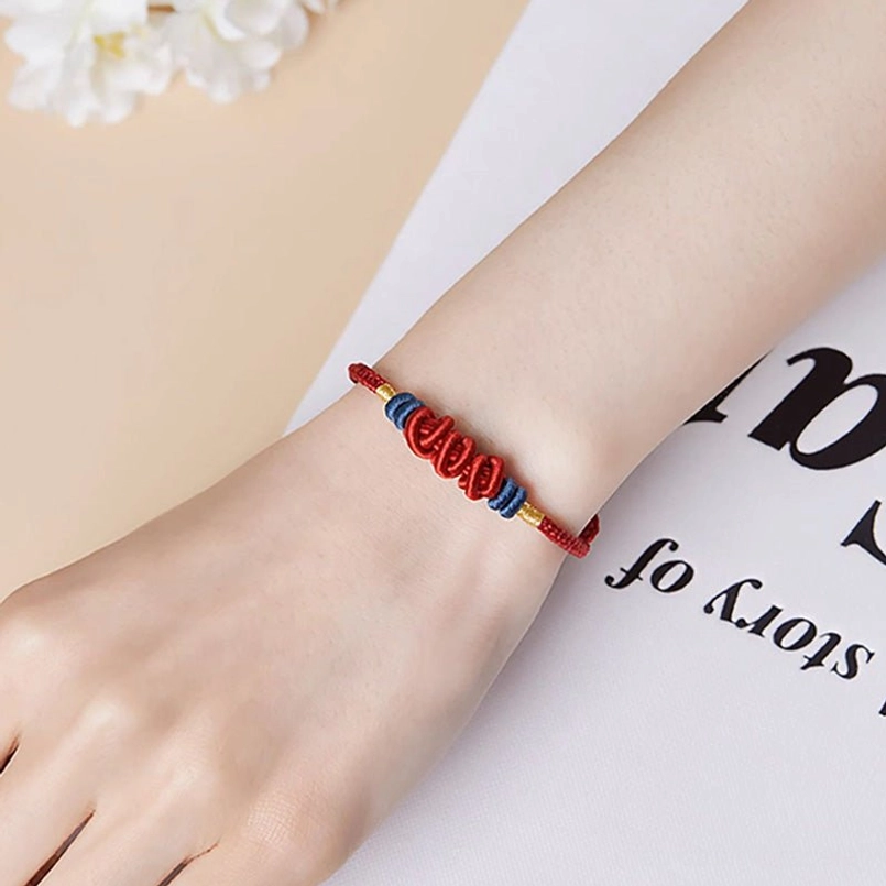Koi fish red string bracelet worn on wrist daily wear styling