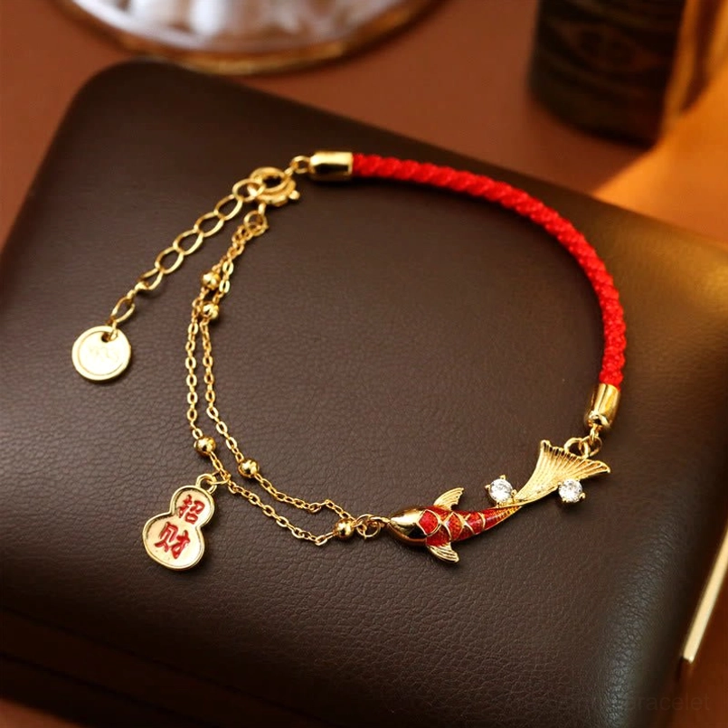 Koi fish gourd charm red string wealth bracelet with gold-plated chain and rhinestone - top-down view