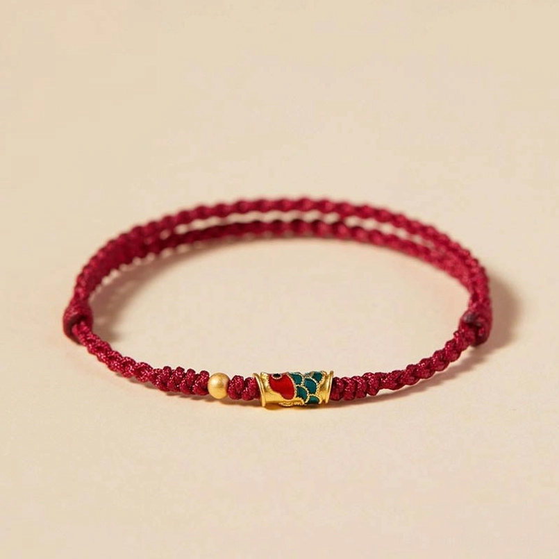 Premium red koi fish red string bracelet with golden bead accent and enamel charm detail