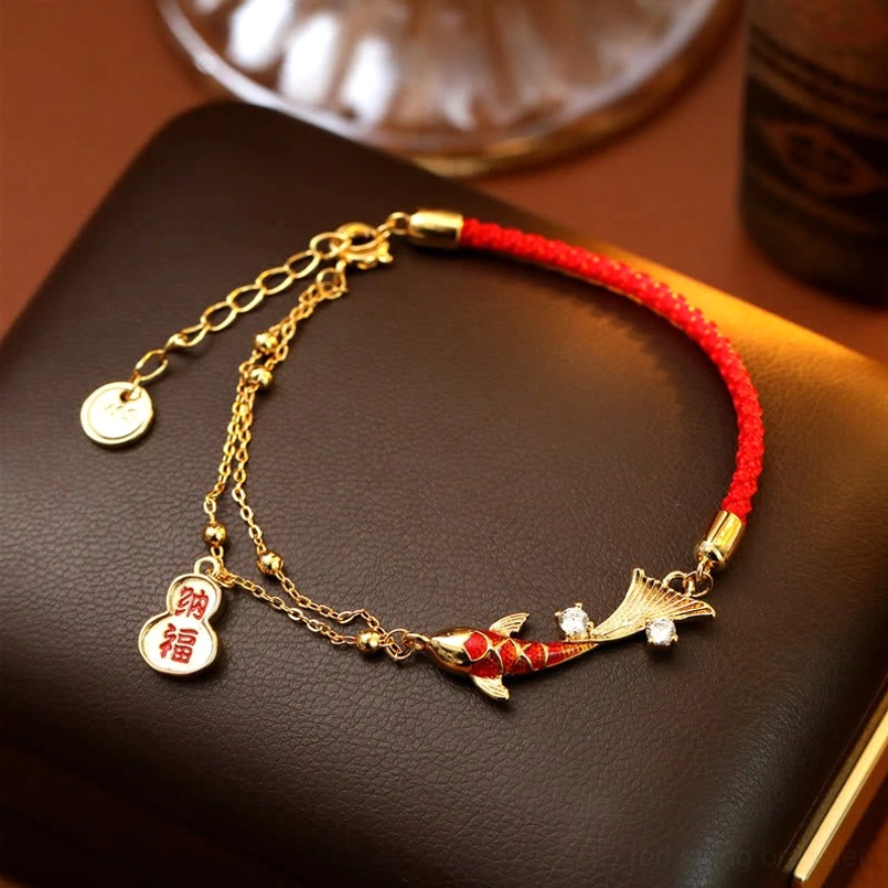 Adjustable wealth bracelet with koi fish and na-fu gourd charm on premium red silk cord