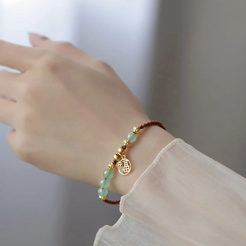 Stacked jade bead fu red string bracelet side profile on hand