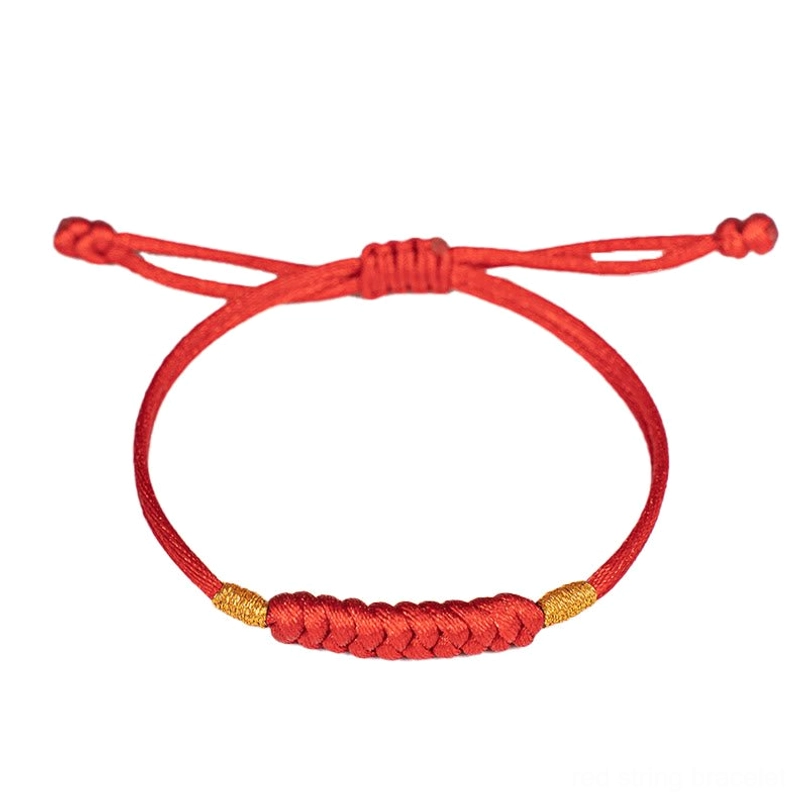 Symmetrical flat lucky knot red string bracelet flat view with gold accents