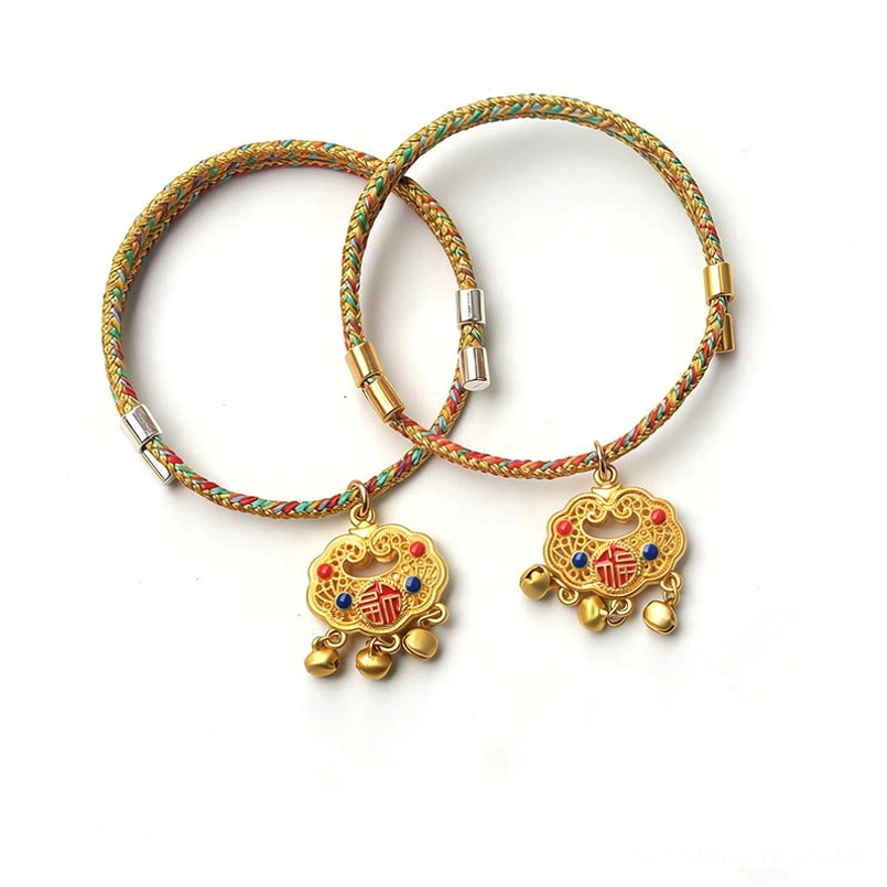 Two crossed lucky pet collars gold metal hardware woven braided protection design