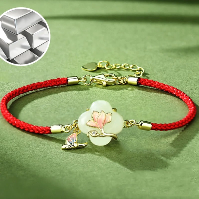 Hetian jade magnolia flower pendant front view with enamel charm and metal texture detail
