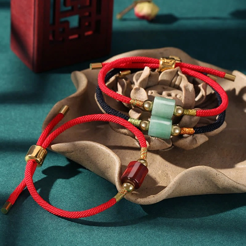 Malachite Tibetan protection bracelet with transformation energy and black braided rope