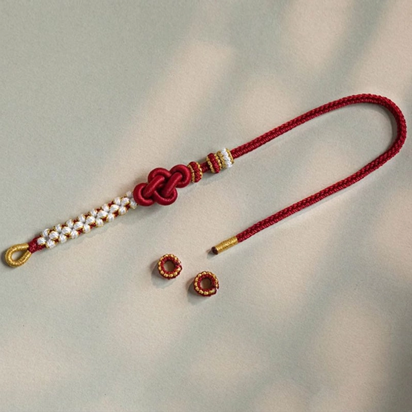 Mandala knot red string bracelet handcrafted with intricate knot design and beaded decoration