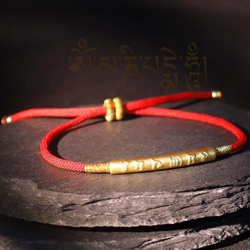 Adjustable Tibetan mantra red string bracelet with sliding knot closure and gold engraved Om Mani Padme Hum bead
