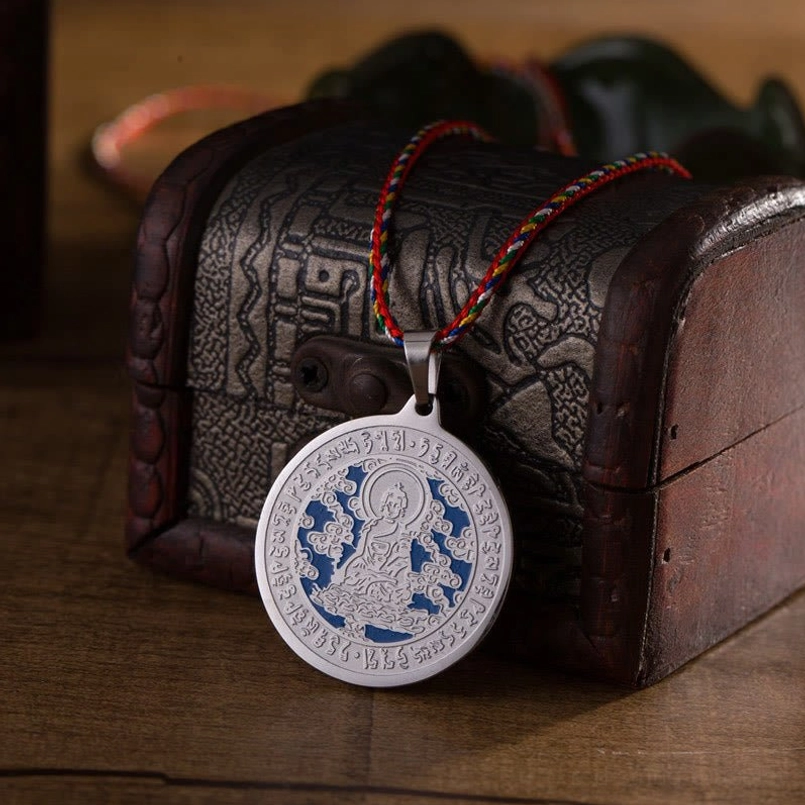 Bhaisajyaguru Medicine Buddha silver finish mantra pendant with sutra engravings and colorful rope side detail