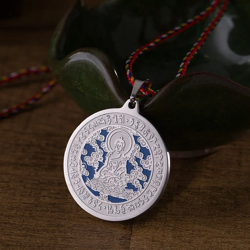 Medicine Buddha blue mantra necklace silver finish with sacred engravings and multicolored rope overhead