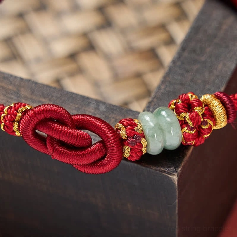 Mist blue style red string jade bracelet flat lay composition