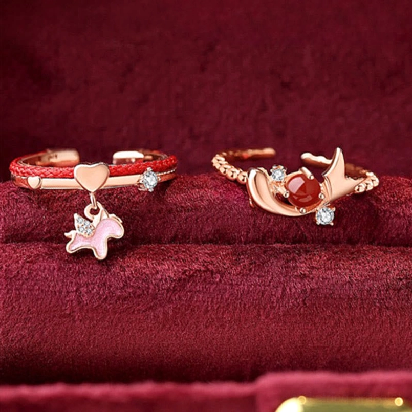 Mixed adjustable open rings - unicorn charm and antler design with red gemstone and woven cord