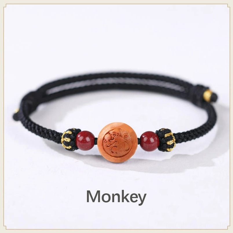 Monkey zodiac peach wood black rope bracelet - sharp intelligent curious charm bracelet