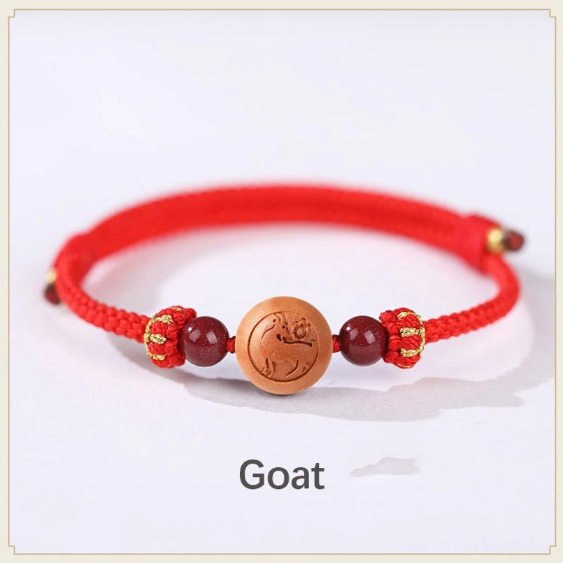 Monkey zodiac peach wood bracelet with center bead and red rope - intelligence and playfulness charm