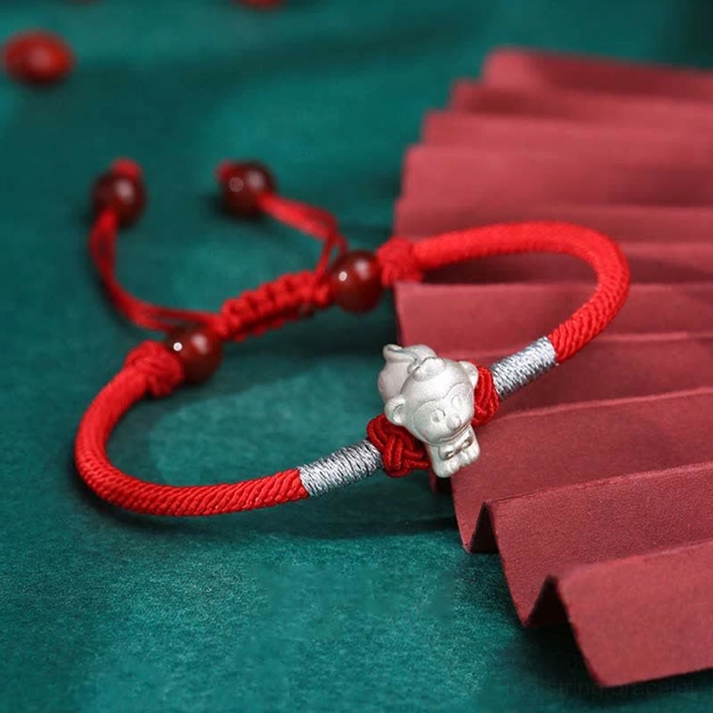 Monkey zodiac sterling silver charm red string bracelet for joy and playfulness