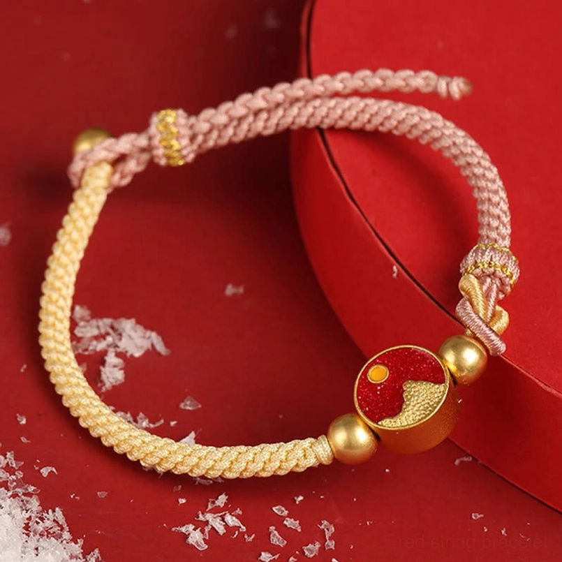 Hand-braided pink-beige woven bracelet with red enamel mountain-sea charm and copper metal beads