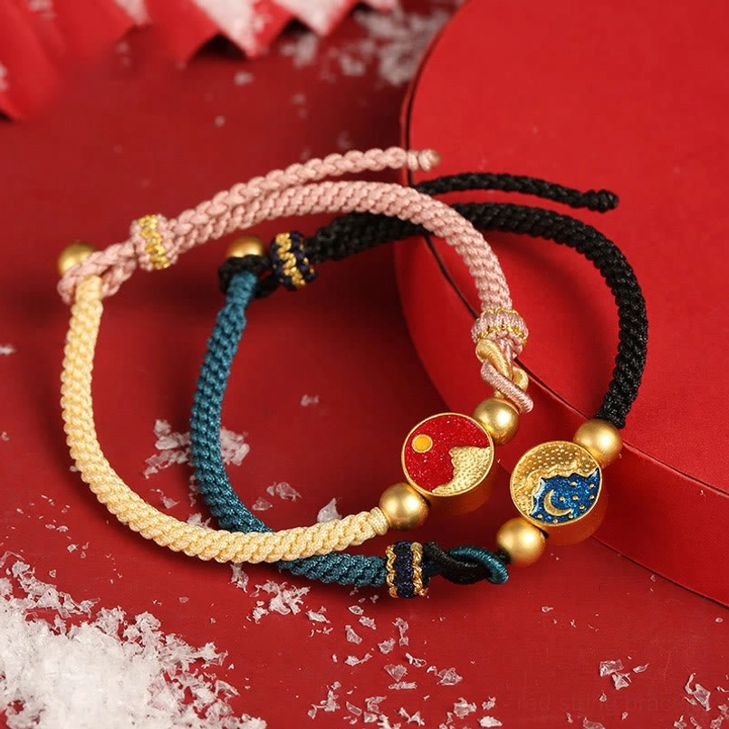 Mountain sea couple bracelets with dual-color red and beige ropes, enamel mountain-sea charms and gold metal accents