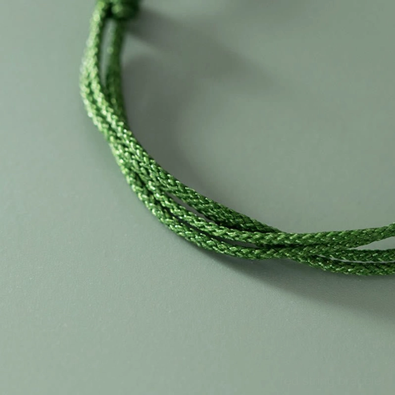 Close up view of premium multi strand woven green rope for luck bracelet