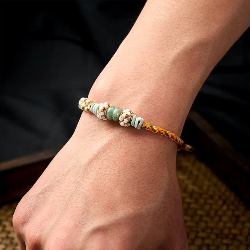 Multicolor string bracelet displaying multiple color options in one piece