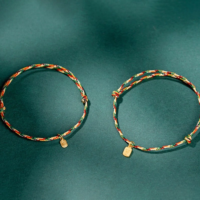 Multicolor lucky bracelet with adjustable knot close up detail
