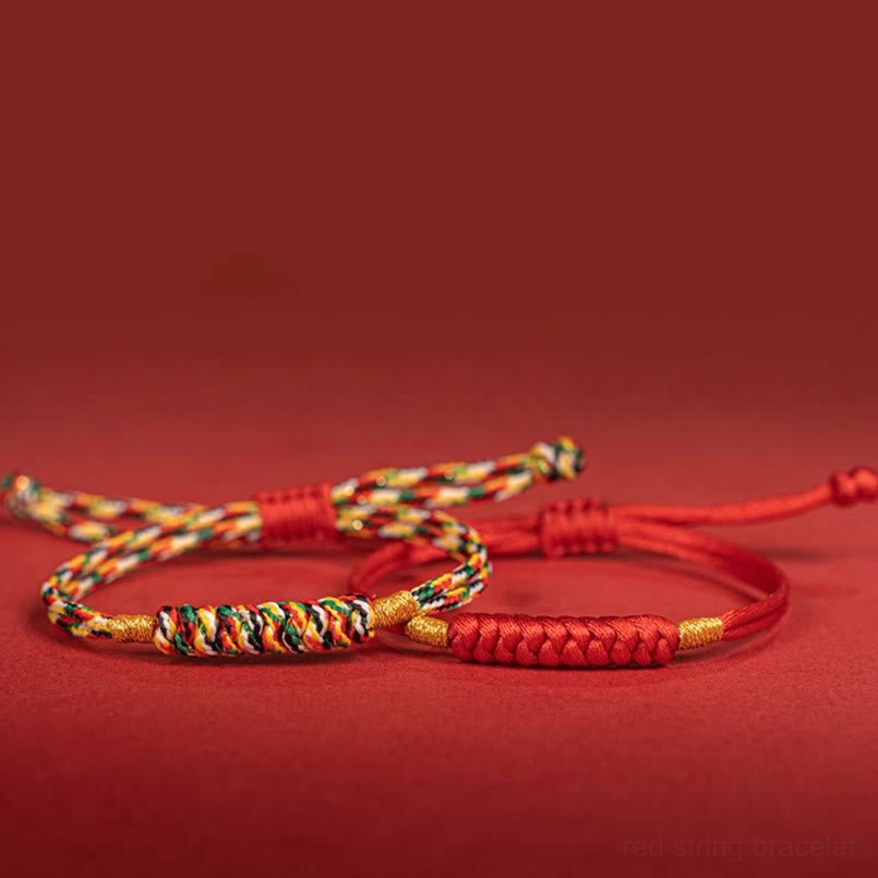 Multicolor braided lucky knot bracelet close up weave texture detail