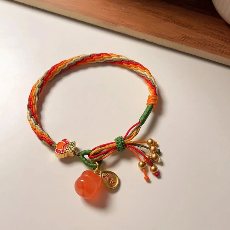 Natural persimmon agate crystal bracelet with metal auspicious charm and woven string