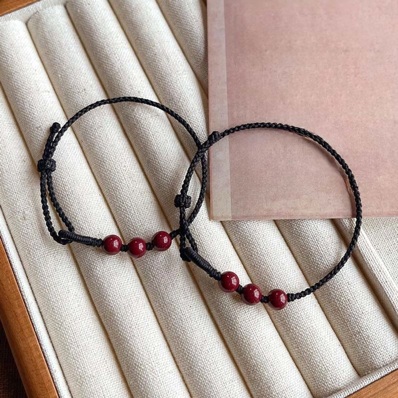 Natural cinnabar bead close up for red string bracelet