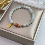 Natural Jade Fu Character Prayer Wheel Prosperity Red String Bracelet In Gift Box
