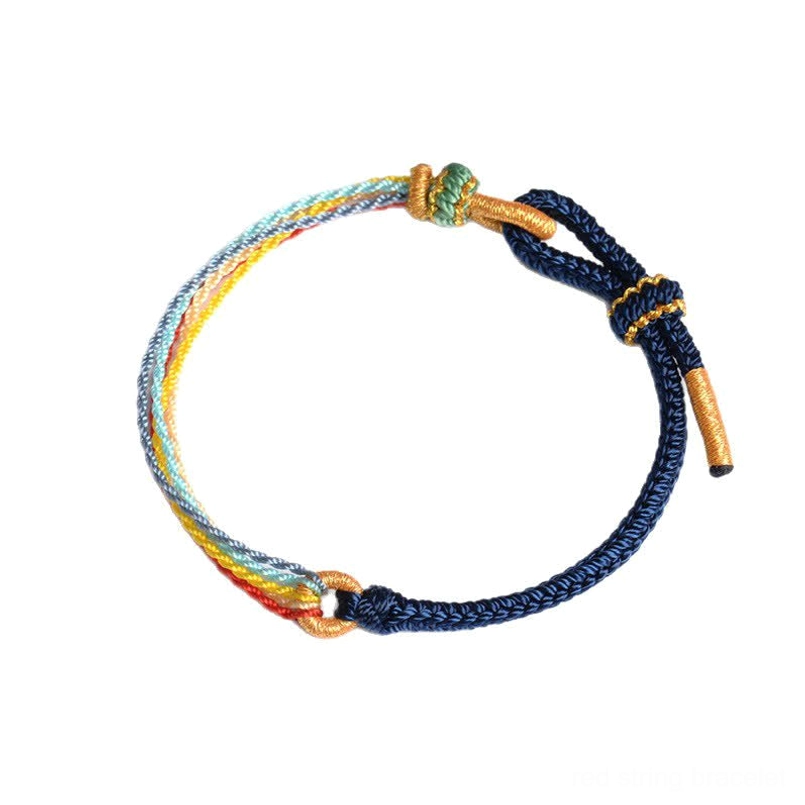 Navy blue five color handmade protection bracelet flat lay overhead view
