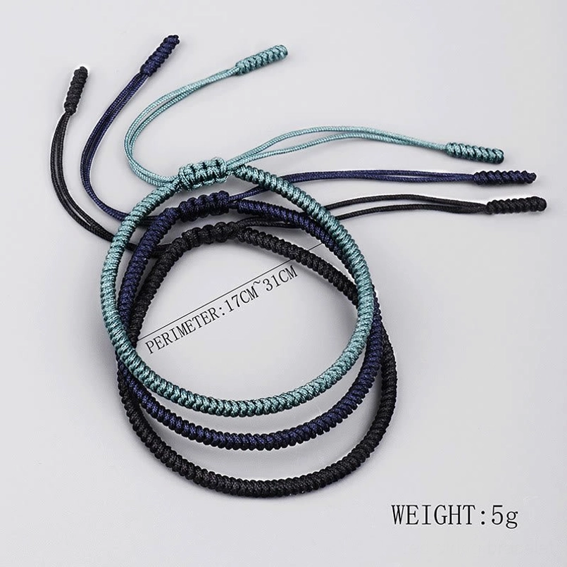 Single navy blue King Kong knot bracelet healing amulet with adjustable sizing