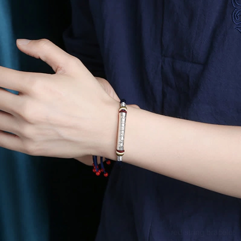 Om Mani Padme Hum bracelet showing adjustable tassel and cord structure