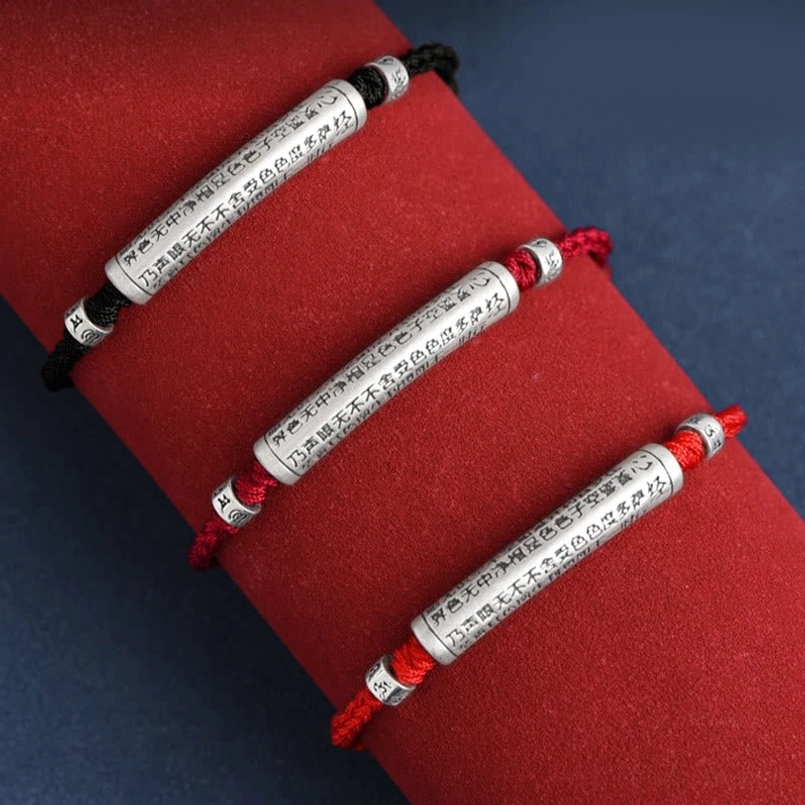 Buddhist mantra red string bracelet collection with multiple sterling silver pendant options